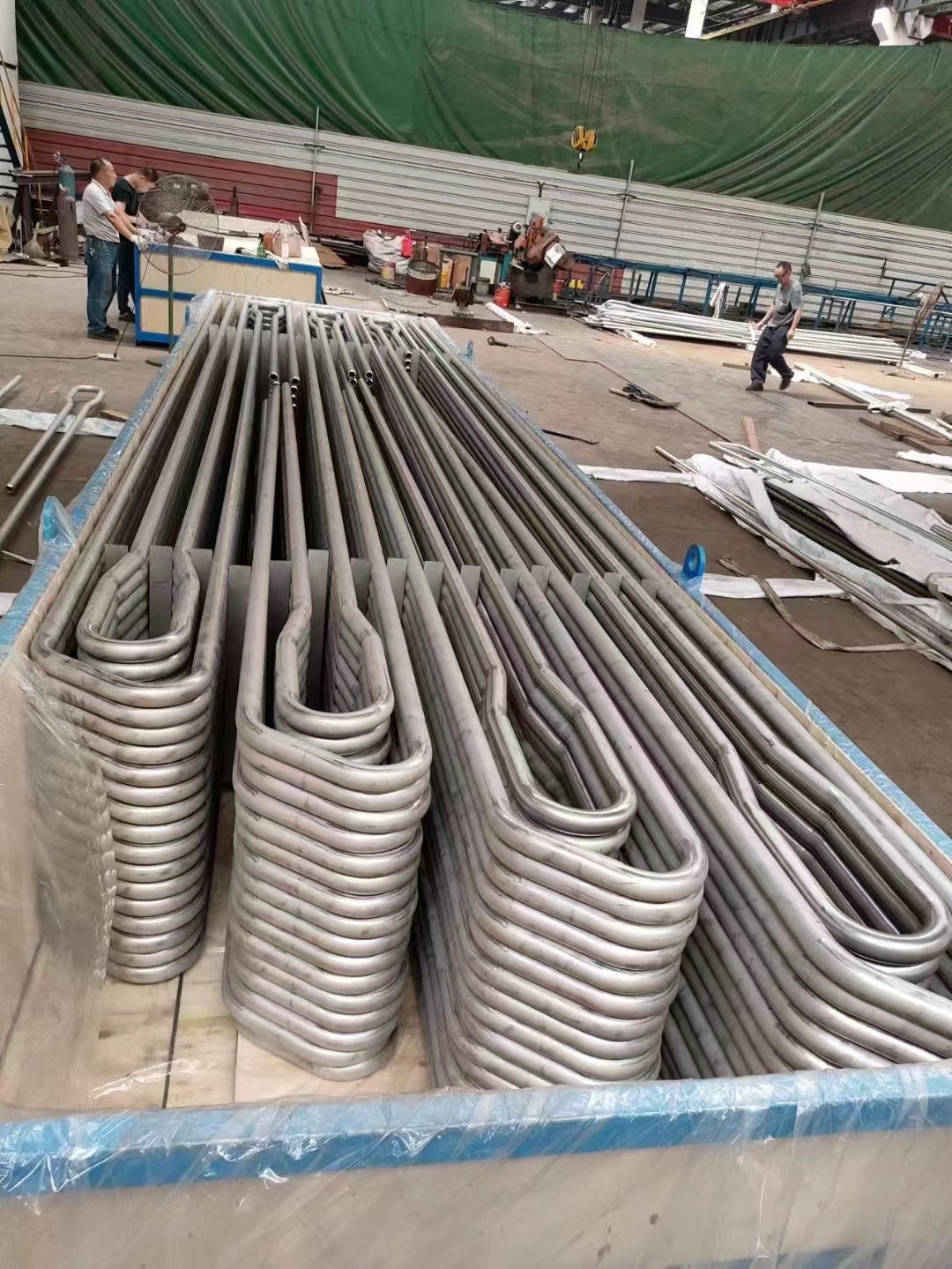Φ38.1×7.5 SA-213T2 每件9根水冷壁管一排，長12米，管節(jié)距50.8mm,鰭片連接，鰭片為膜式扁鋼厚δ6.4㎜，材料為15CrMo，采用雙面坡口焊接型式